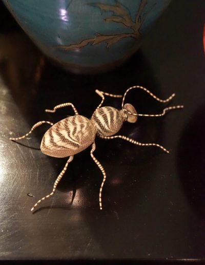 Striped beetle £350. Beetle made with layers of veiling over striped feathers and legs bound by hand with dip-dyed silk thread. Size H 3 x L 11 x W 8cm. Sales: contact Bridget at studio@bridgetbailey.co.uk