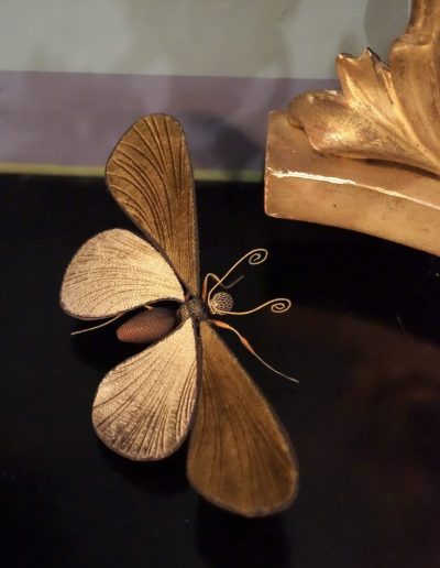 Velvet Butterfly bronze/gold £550. Embossed velvet, body wrapped in iridescent fibre, legs bound by hand with fine wire to give iridescent filigree effect. Size H 5 x W 18 x L 9cm. Sales: contact Bridget at studio@bridgetbailey.co.uk